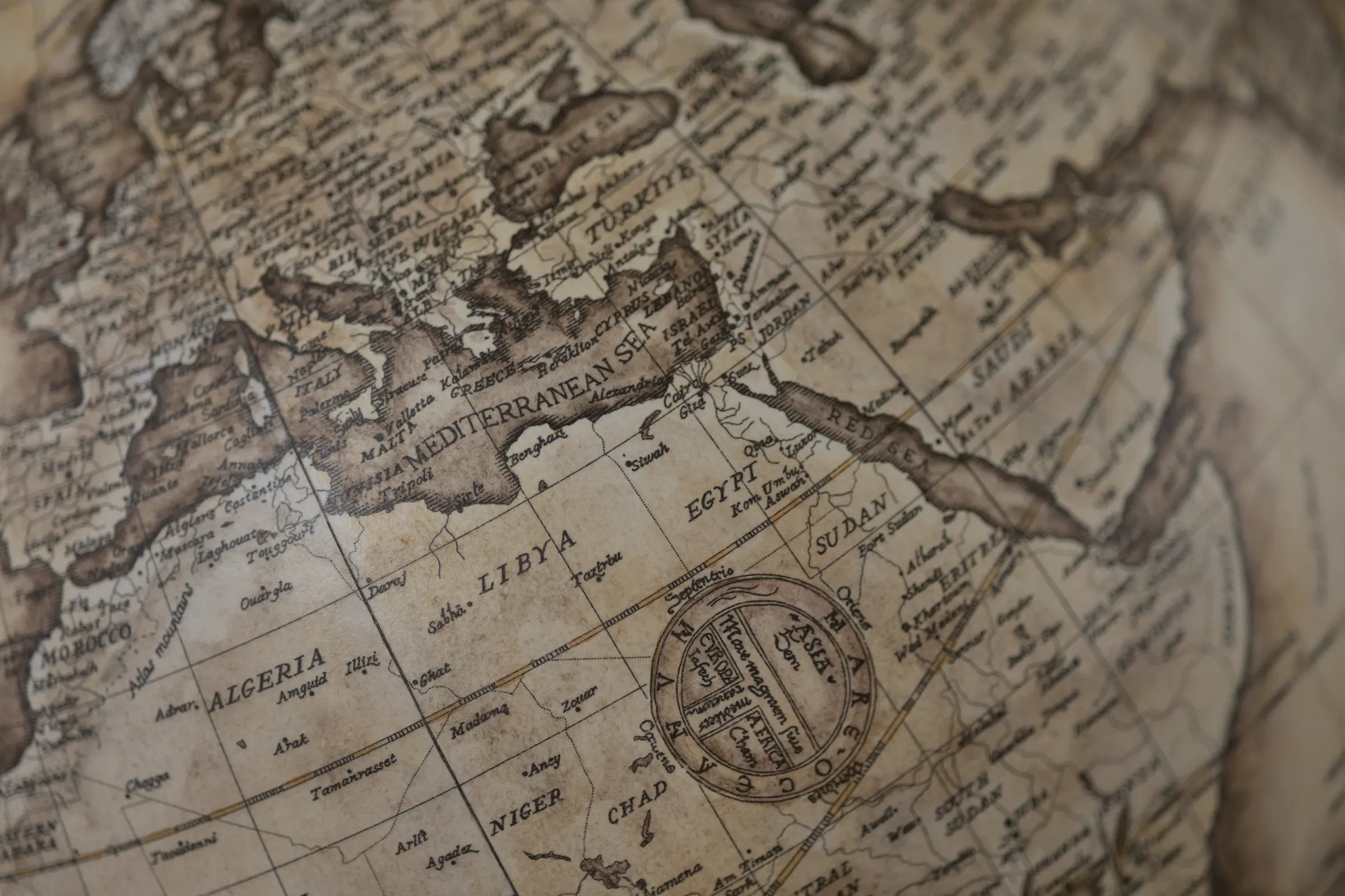 A close detail of the Mediterranean drawn across a terrestrial globe